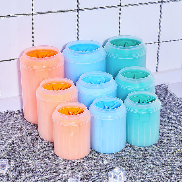Paw cleaner cups in coral, blue and teal, in three sizes