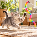 AI illustration: Mabel, our silver tabby cat, with the Plush Caterpillar Cat Teaser Wand.